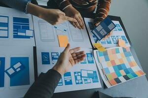 ux Graphic designer creative sketch planning application process development prototype wireframe for web mobile phone . User experience concept. photo