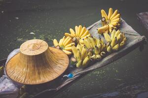 Traditional floating market in Damnoen Saduak near Bangkok photo