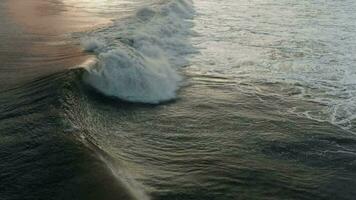 waves in the ocean at sunset, view from above video