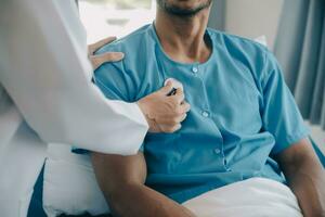 Doctors do it for the health of it. Shot of a mature doctor examining his patient who is concerned about his knee. photo