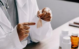 Female doctor holding virtual Lungs in hand. Handrawn human organ, copy space on right side, raw photo colors. Healthcare hospital service concept stock photo