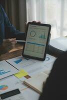 Team of business people working together in the meeting room office, teamwork background charts and graphs banner, double exposure successful teamwork,business planning concept. photo