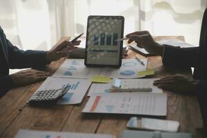 Team of business people working together in the meeting room office, teamwork background charts and graphs banner, double exposure successful teamwork,business planning concept. photo