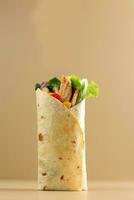 Wrap Sandwich Stuffed with Grilled Chicken, Tomato, Onion, Corn, and Fresh Vegetables, photo