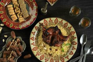 Top View Biryani Rice with Roasted Spiced Chicken photo