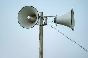 loudspeakers installed on the pillars of a mosque and used to make the call to prayer photo