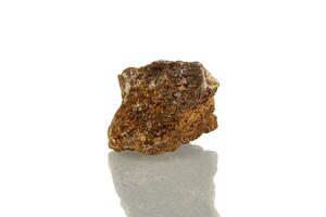 macro mineral stone Wulfenite on a white background photo