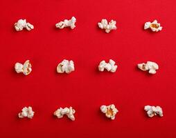 popcorn macro on a red background photo