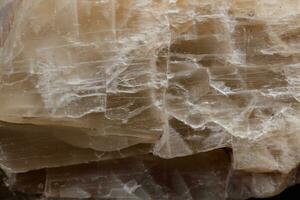 Macro mineral stone Moonstone a black background photo