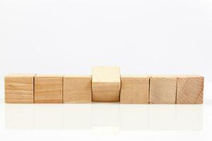 Wooden cubes on a white background photo