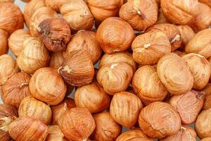 macro hazelnuts nuts on a white background photo