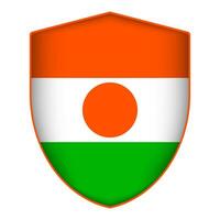 Niger flag in shield shape. Vector illustration.