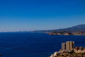 landscape on the Spanish coast near the city of Benidorm on a summer day photo