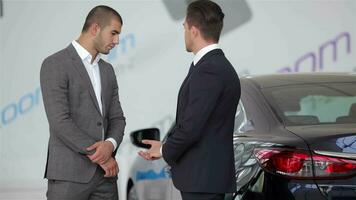 Shaking hands while purchase new car video