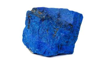 Macro Azurite mineral stone with Pyrite inserts on a white background photo