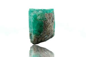 macro mineral stone emerald on a white background photo