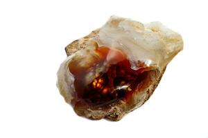 Macro mineral stone fiery Agate on a white background photo