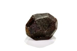 macro mineral stone  Garnet, on a white background photo