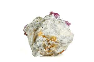 Macro mineral stone Ruby in rock on white background photo