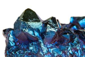 Macro mineral stone Titanium Quartz, Flame Aura Quartz on a white background photo