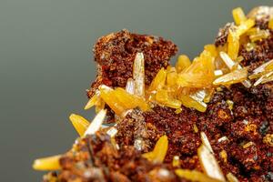 macro mineral Wulfenite stone on a black background photo