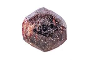 Macro of a mineral garnet stone on a white background photo