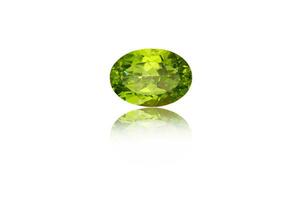 macro mineral stone cut Peridot on a white background photo