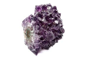 Macro mineral stone Amethysts eye crystals on white background photo