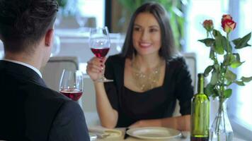 Call the waiter while toasting with wine video