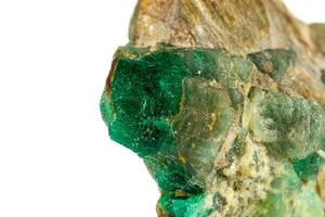 macro stone mineral emerald on a white background photo