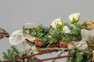 Christmas composition of flowers and Christmas decorations photo