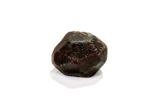 macro mineral stone  Garnet, on a white background photo