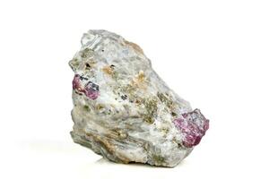 Macro mineral stone Ruby in rock on white background photo