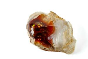 Macro mineral stone fiery Agate on a white background photo