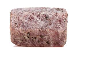 Macro mineral stone Ruby in the breed a white background photo
