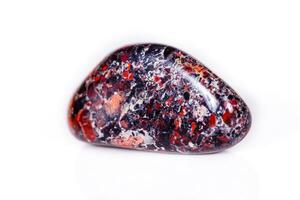 Macro mineral stone Jasper leopard on white background photo