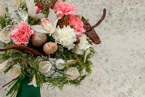 Christmas composition of flowers and Christmas decorations photo