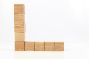 Wooden cubes on a white background photo