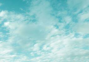 Sky and fluffy cloud scenery in the morning is incredibly calming to start the day,sky and fluffy white cloud made me feel relaxed,sky and fluffy cloud scenery take a majestic and breathtaking beauty photo