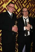 Tom Wilkinson  Paul Giamatti arriving at the HBO Post Golden Globe Party at Circa 55 at the Beverly Hilton Hotel in Beverly Hills CA on January 11 2009 2008 photo