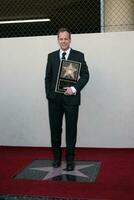 Kiefer Sutherland  Joel Schumacher at the Hollywood Walk of Fame ceremony for Kiefer Sutherland in Hollywood CA December 9 2008 photo