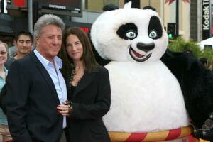 Dustin  Lisa Hoffman arriving at the Kung Fu Panda  Secrets of the Furious Five DVD Debut at Gaumans Chinese Theater in Los Angeles CA on November 9 2008 photo