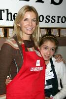 Katherine Kelly Lang  Daughter Zoe DAndrea at the LA Mission Thanksgivng Feeding of the Homeless in Los Angeles CA November 26 2008 photo