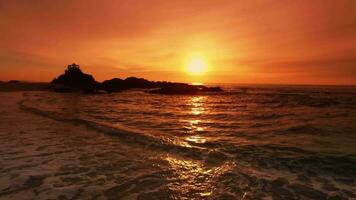 arancia spiaggia tramonto video