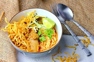 Khao Soi Recipe,Khao Soi,Khao Soi Kai, Thai Noodles Khao Soi, Chicken Curry with seasoning photo