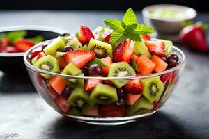 Fruit salad with strawberry, kiwi, watermelon and mint in glass bowl. Generative AI. photo