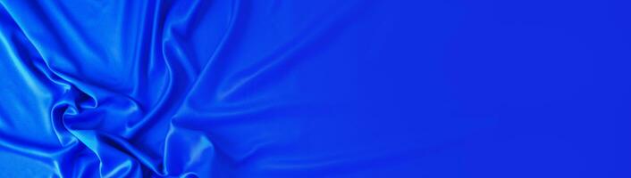 blue silk background. abstract banner copy space photo