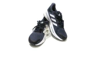 Huelva, Spain, 2.20.2023,Adidas Solar Glide 5, surely the best running shoes, quality  price. Isolated on a white background. photo