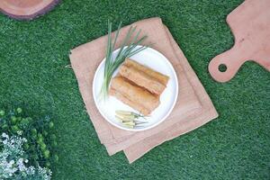 Lumpia or lunpia, traditional snacks from Semarang, Central Java, Indonesia. Traditional spring roll photo