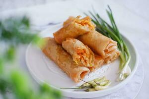 Lumpia or lunpia, traditional snacks from Semarang, Central Java, Indonesia. Traditional spring roll photo